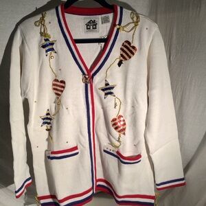 Storybook knit titled “America the Beautiful”.